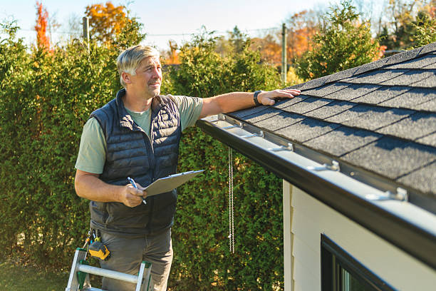 Professional Storm Damage Roof Repair technician working in Corolla, NC